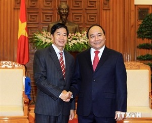 Deputy PM Nguyen Xuan Phuc welcomes Vientiane’s Lord Mayor - ảnh 1